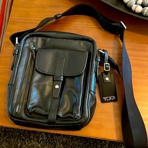 Tumi cross body leather travel purse - black leather